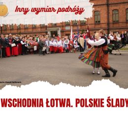 Zdjęcietańczącej pary w strojach ludowych wykonał Dawid Hallmann. 